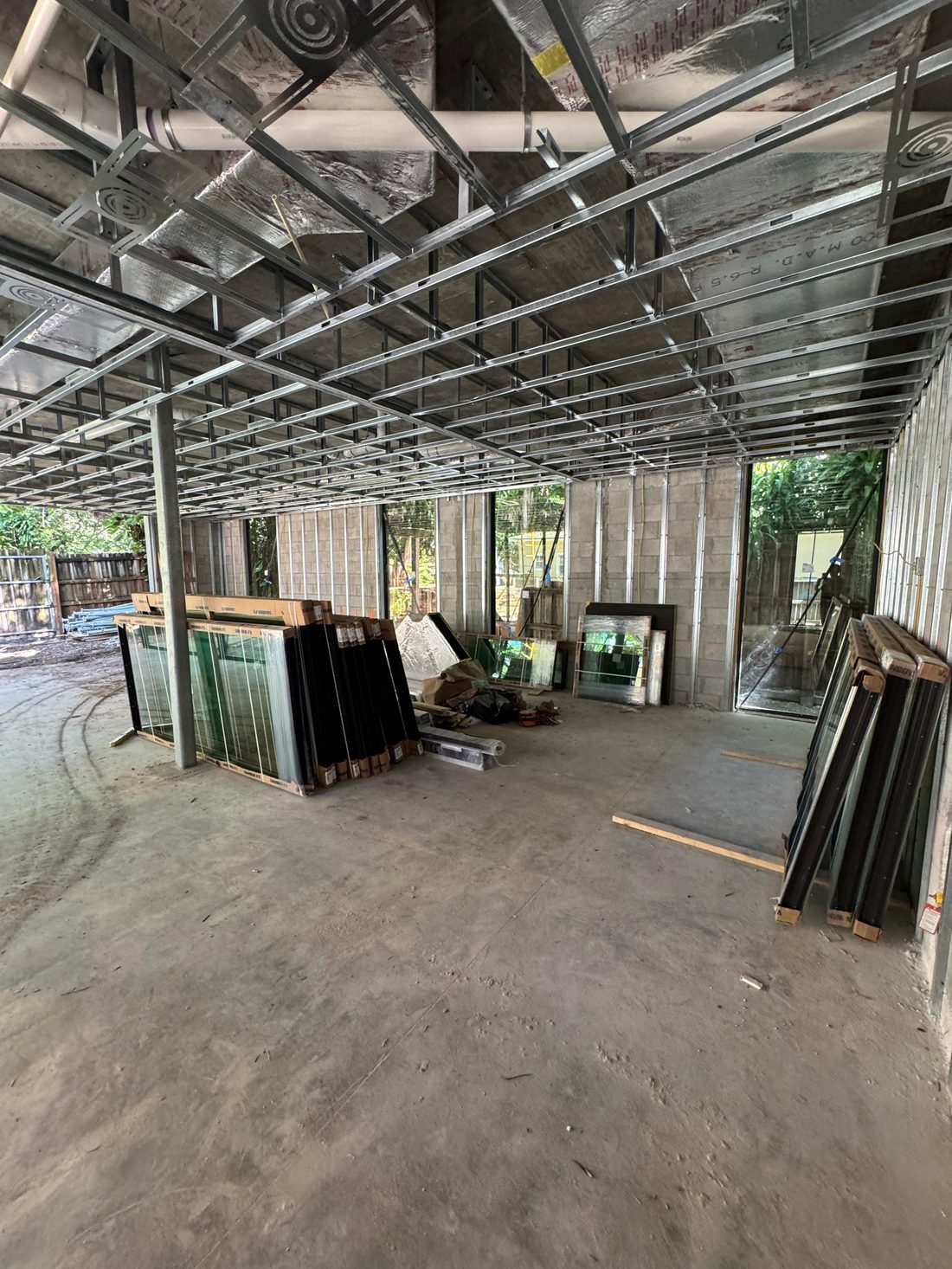 Steel-joist framing during a Moura interior remodel
