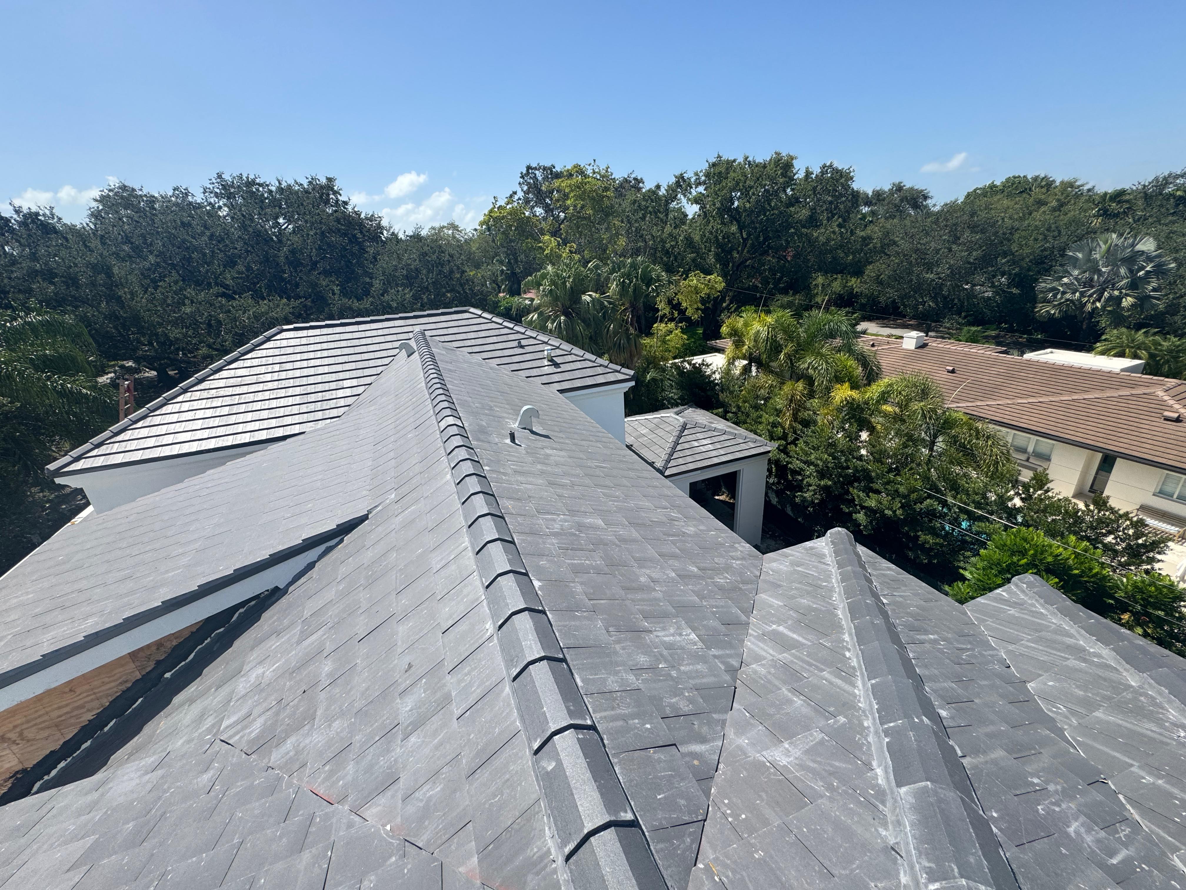Barrel tile roof installed by Moura General Construction in South Florida
