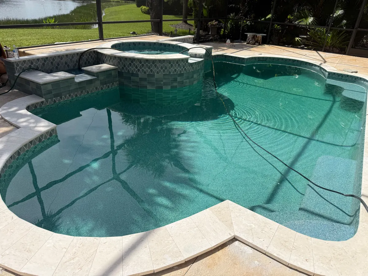 Moura General Construction — pool and spa renovation with glass tile