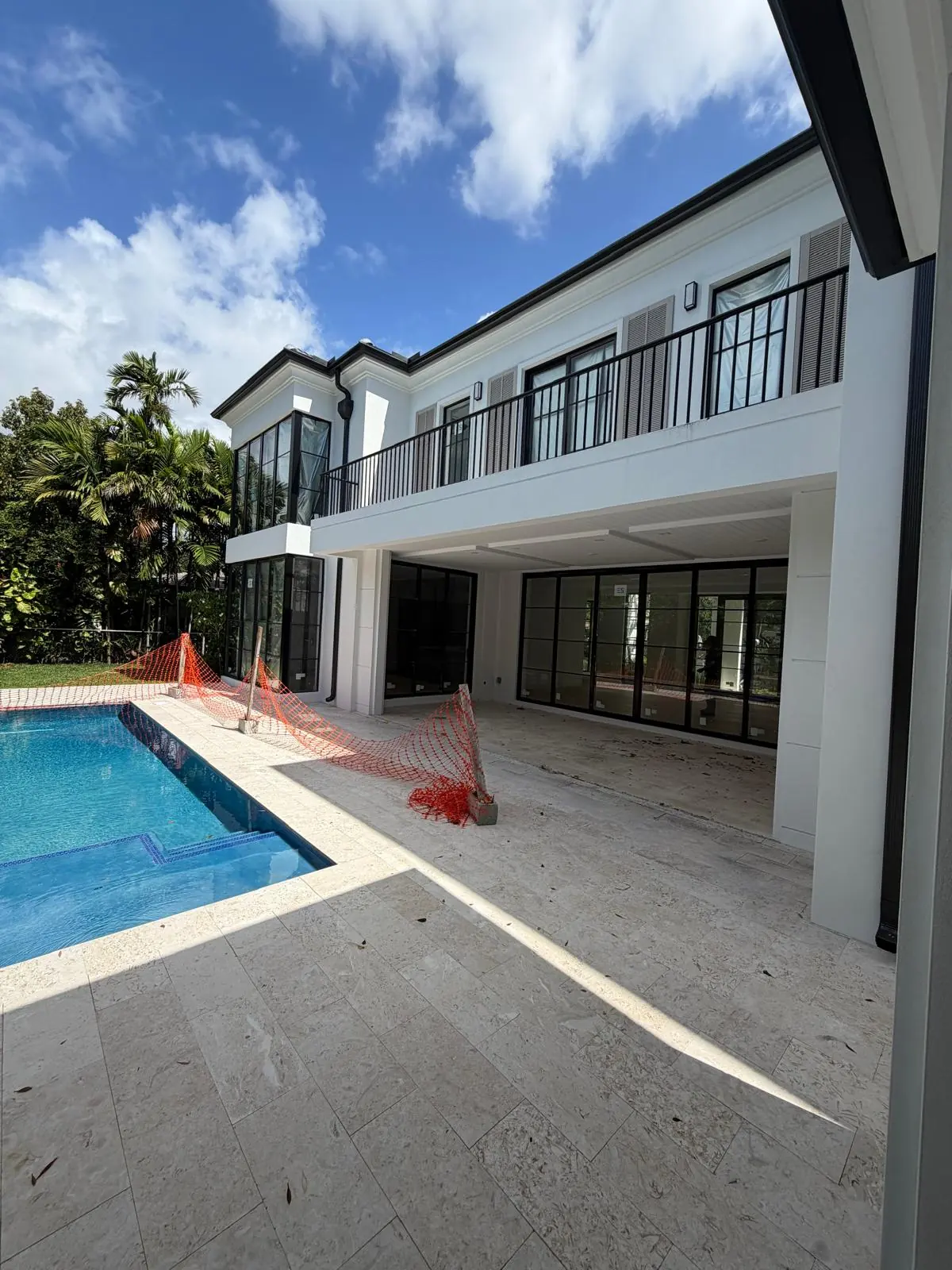 Moura General Construction — custom pool and rear elevation