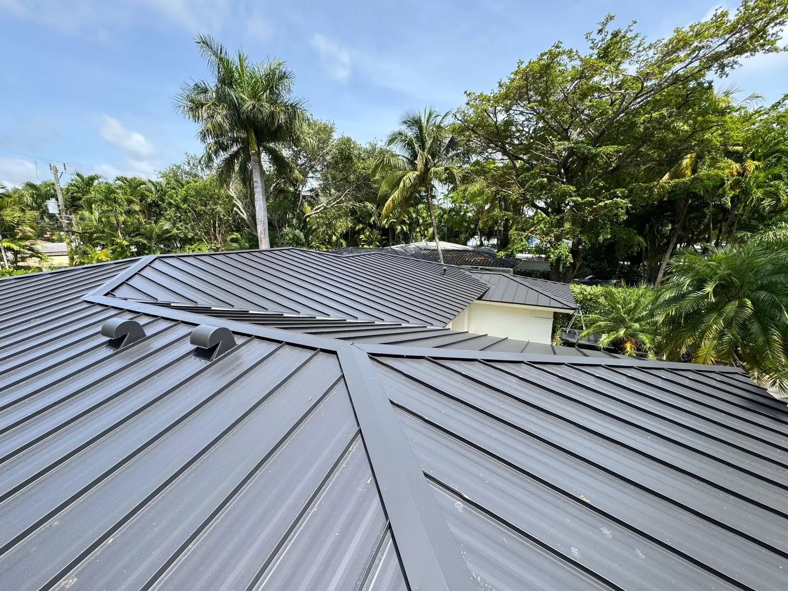 Moura General Construction — metal standing seam roof